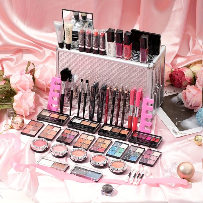 Silver makeup case displayed with lipsticks, brushes and eyeshadows