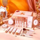 20-piece makeup and skincare set laid out in front of its pink gift box