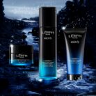 Men's moisturizing toner, cleanser and cream on a dark blue background