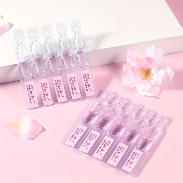 Sakura serum ampoules in their tray with cherry blossoms