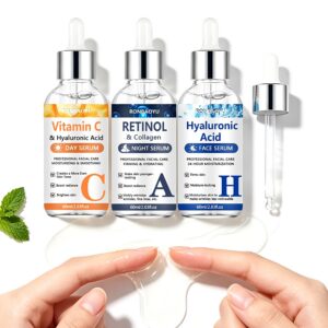 Vitamin C, Retinol and Hyaluronic Acid serum bottles on a light background