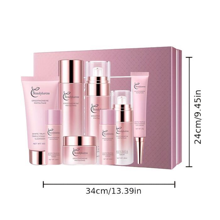 Pink 8-piece face care set in front of its gift box on a white background with box dimensions