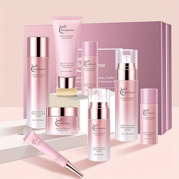 White truffle hydrating face care bottles, tubes and cream jar on a light pink display